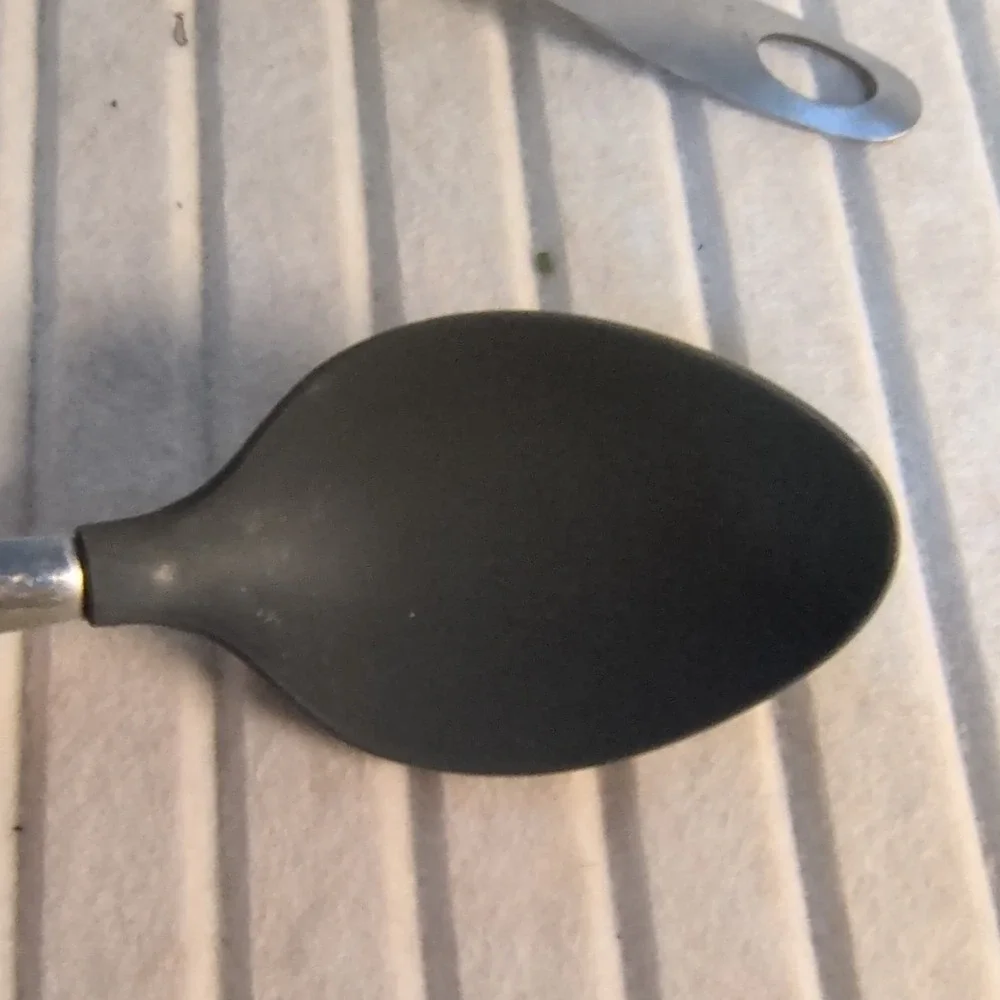 Hoffritz Black‎ & Silver Stainless Steel Cooking Spoon & Turner is unbranded